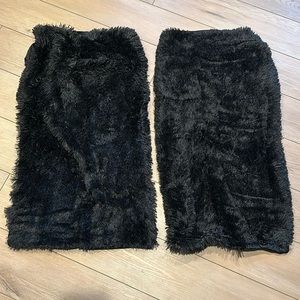 Two brand new fuzzy, black pillow covers